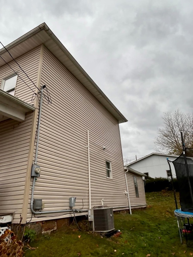 Tan siding after exterior washing
