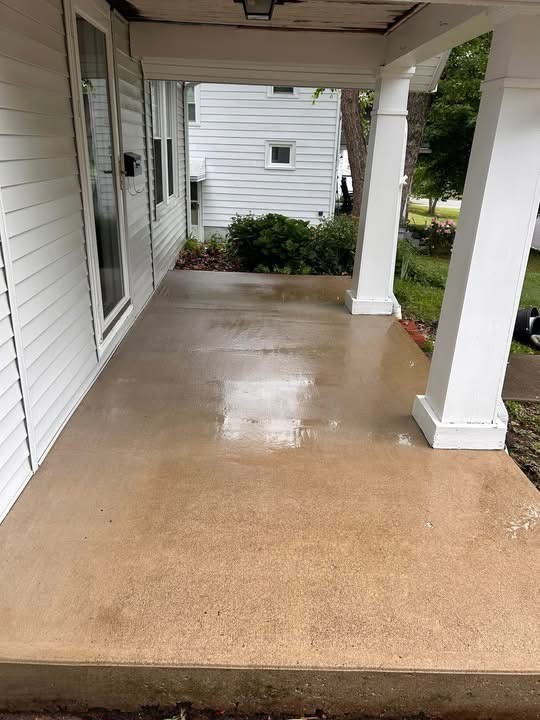 Concrete porch after pressure washing